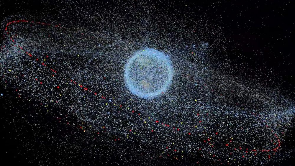 Kessler syndrome i kosmiczne śmieci tworzące gęstą chmurę odłamków wokół Ziemi