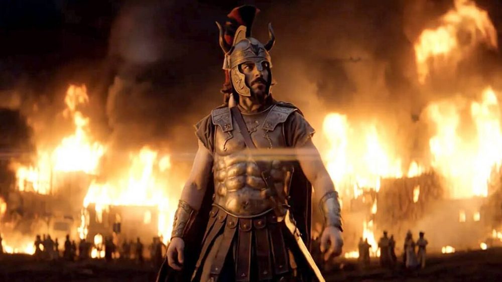 Odysseus: The Fall – Odyseusz w zbroi na tle płonącego miasta w filmie wygenerowanym przez AI